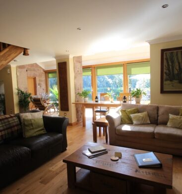 Open plan living area at Kinblethmont Coach House